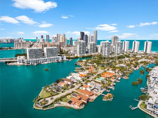 an aerial view of houses outdoor space and swimming pool