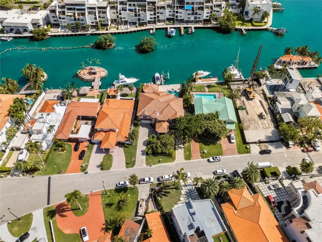 an aerial view of a house with outdoor space swimming pool and outdoor seating