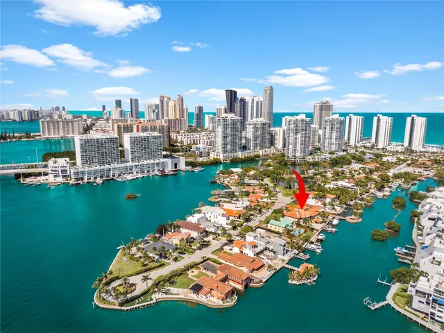 a parking space with lots of residential buildings and ocean view