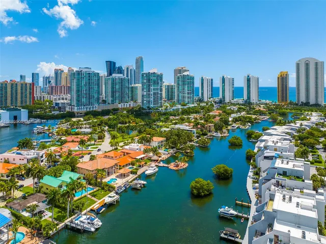 a view of entryway and hall with a living room