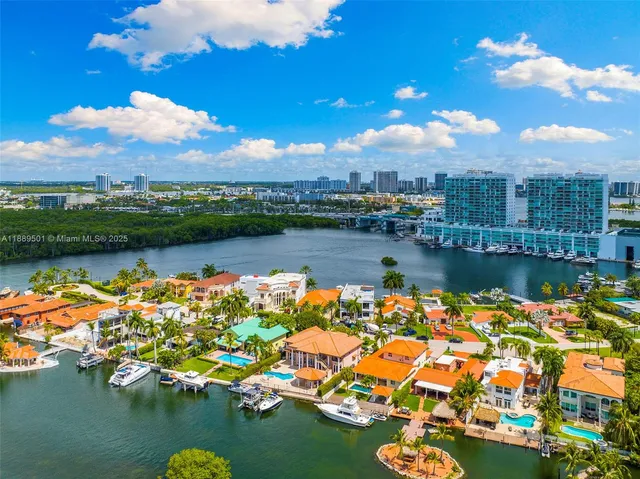 a large kitchen with a table and chairs