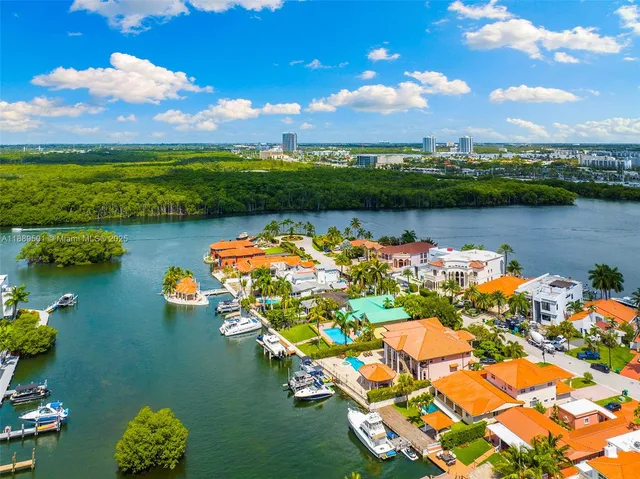 a room with lots of wooden furniture dining table and chairs