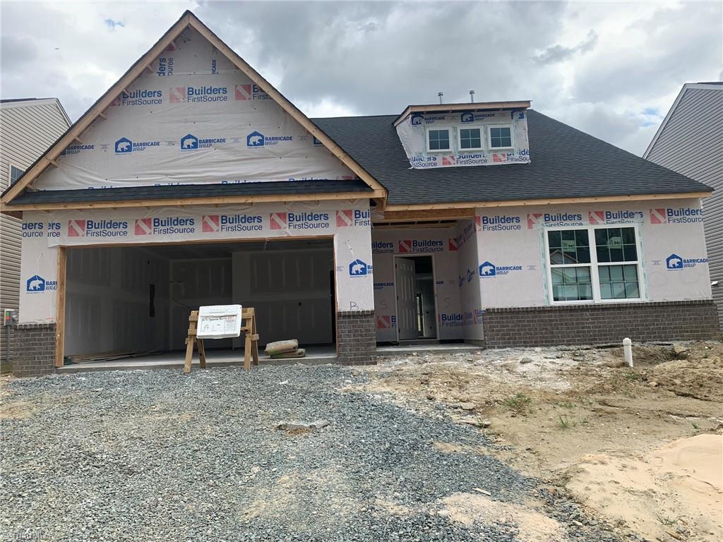 3216 Sycamore Point Trail High Point, NC 27265 - Photo 1 of 23 Front Door will match shutters, Bushes and Sod will be installed, Windows in garage door