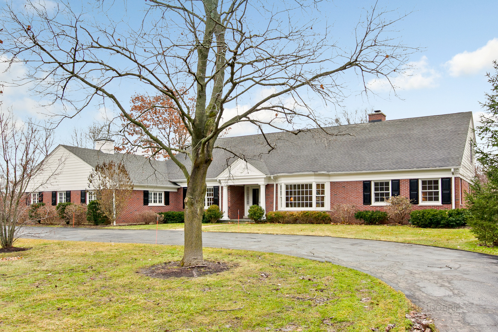 455 Landreth Lane Northfield, IL 60093 - Photo 1 of 31 a front view of house with yard and green space