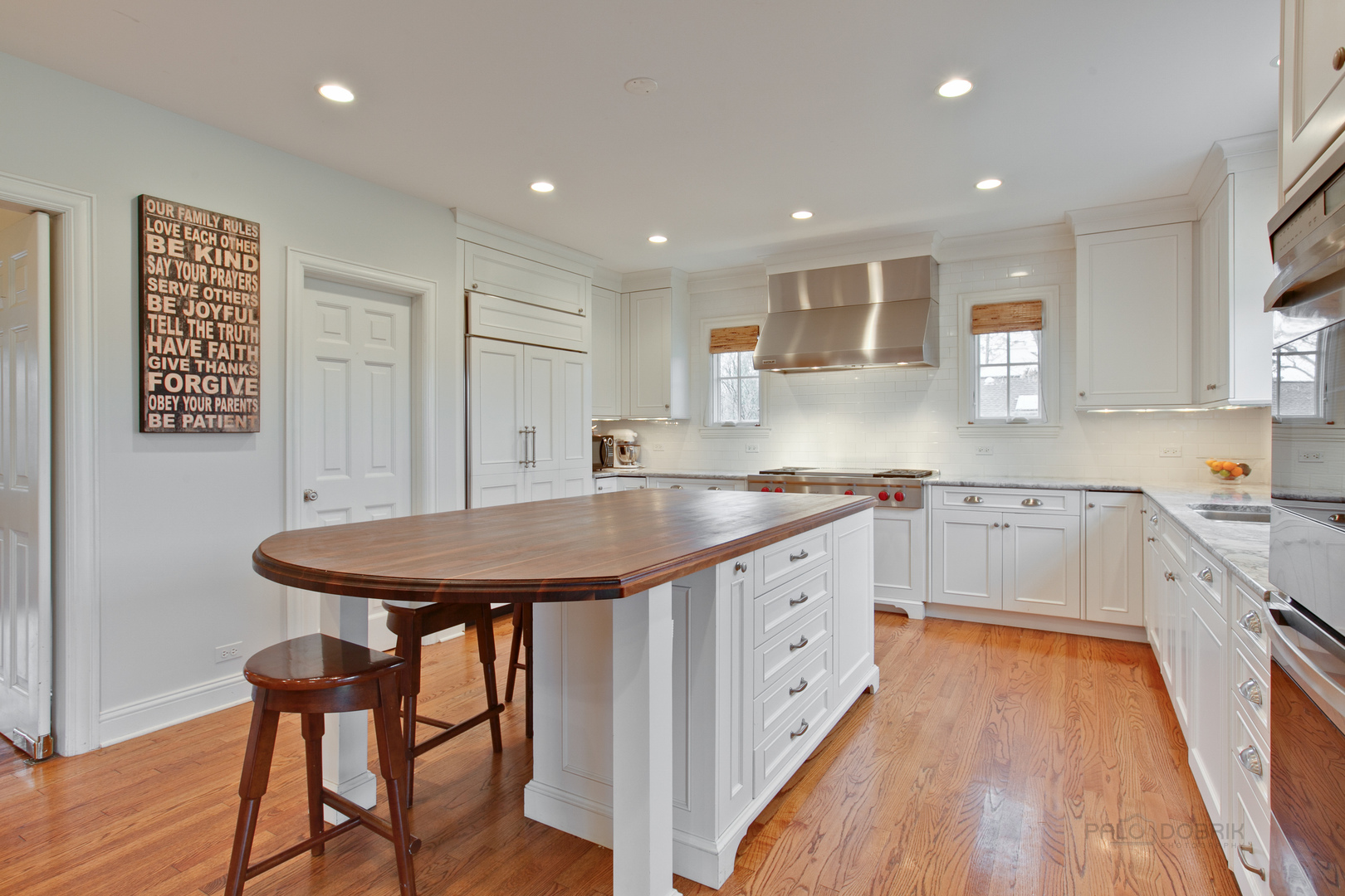 455 Landreth Lane Northfield, IL 60093 - Photo 15 of 31 a large kitchen with stainless steel appliances granite countertop a sink and cabinets