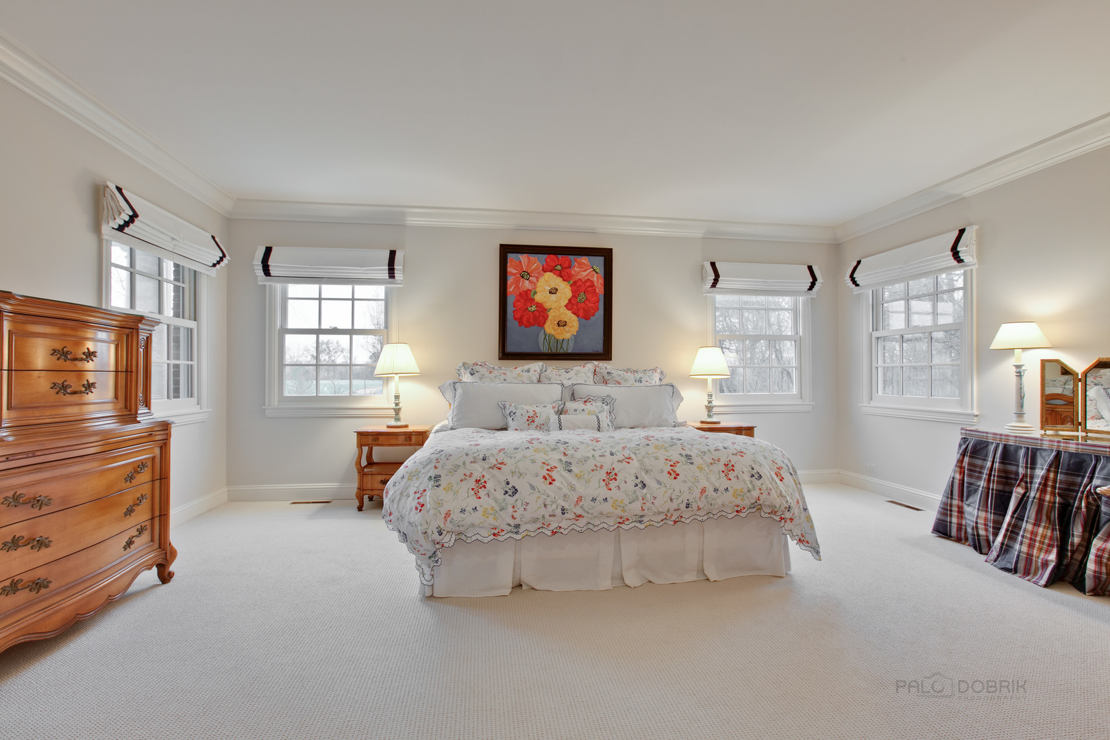 455 Landreth Lane Northfield, IL 60093 - Photo 19 of 31 a bedroom with a bed and dresser with window