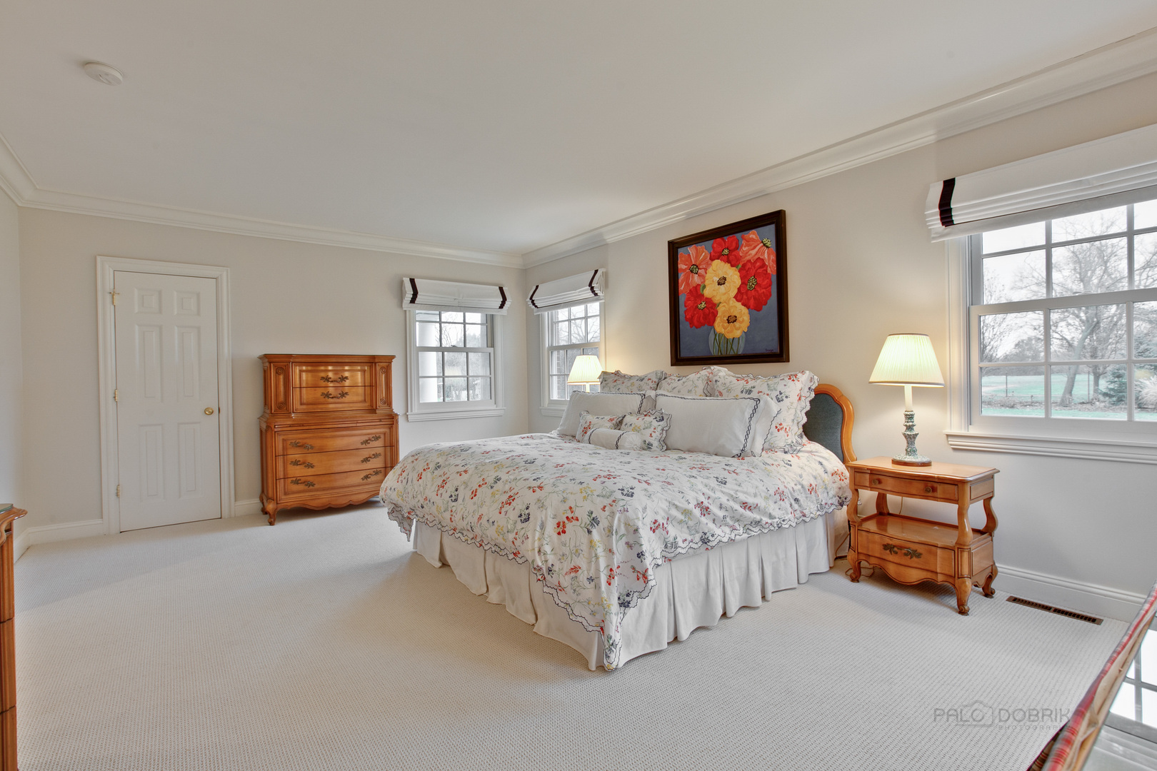 455 Landreth Lane Northfield, IL 60093 - Photo 20 of 31 a spacious bedroom with a bed and a window