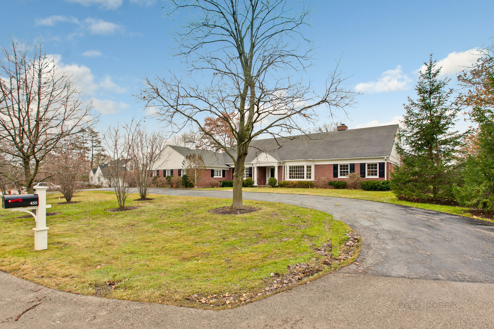 455 Landreth Lane Northfield, IL 60093 - Photo 3 of 31 a front view of a house with a yard