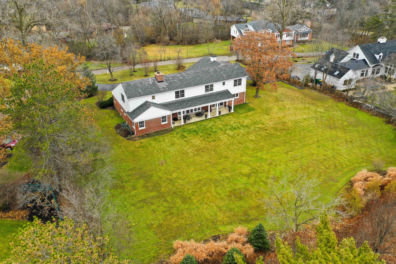455 Landreth Lane Northfield, IL 60093 - Photo 28 of 31 a view of a swimming pool with a yard