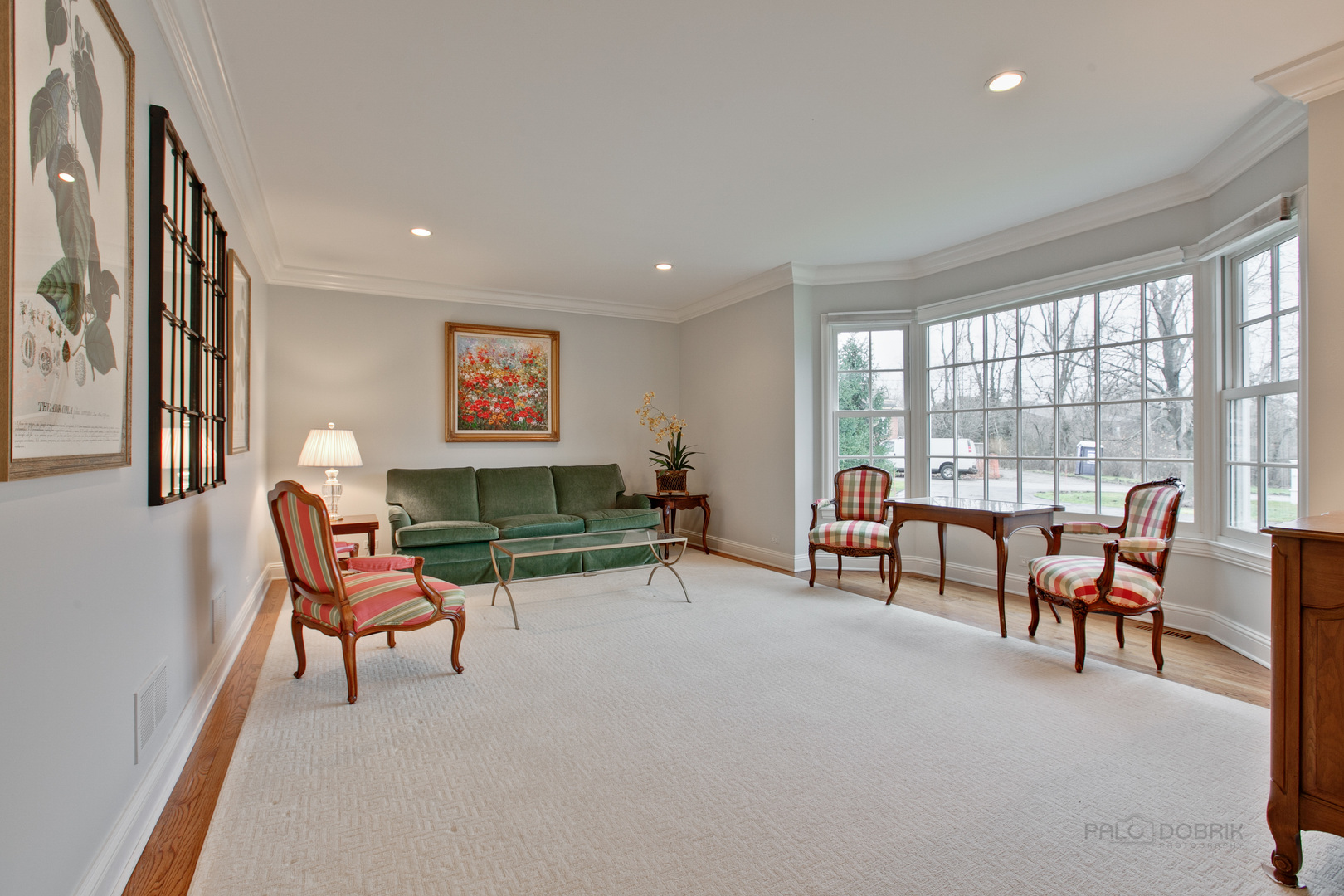 455 Landreth Lane Northfield, IL 60093 - Photo 6 of 31 a living room with furniture and a floor to ceiling window