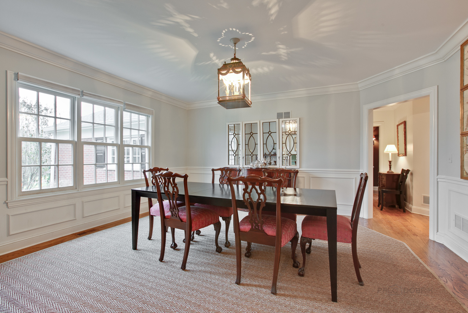 455 Landreth Lane Northfield, IL 60093 - Photo 7 of 31 a view of a dining room with furniture window and wooden floor