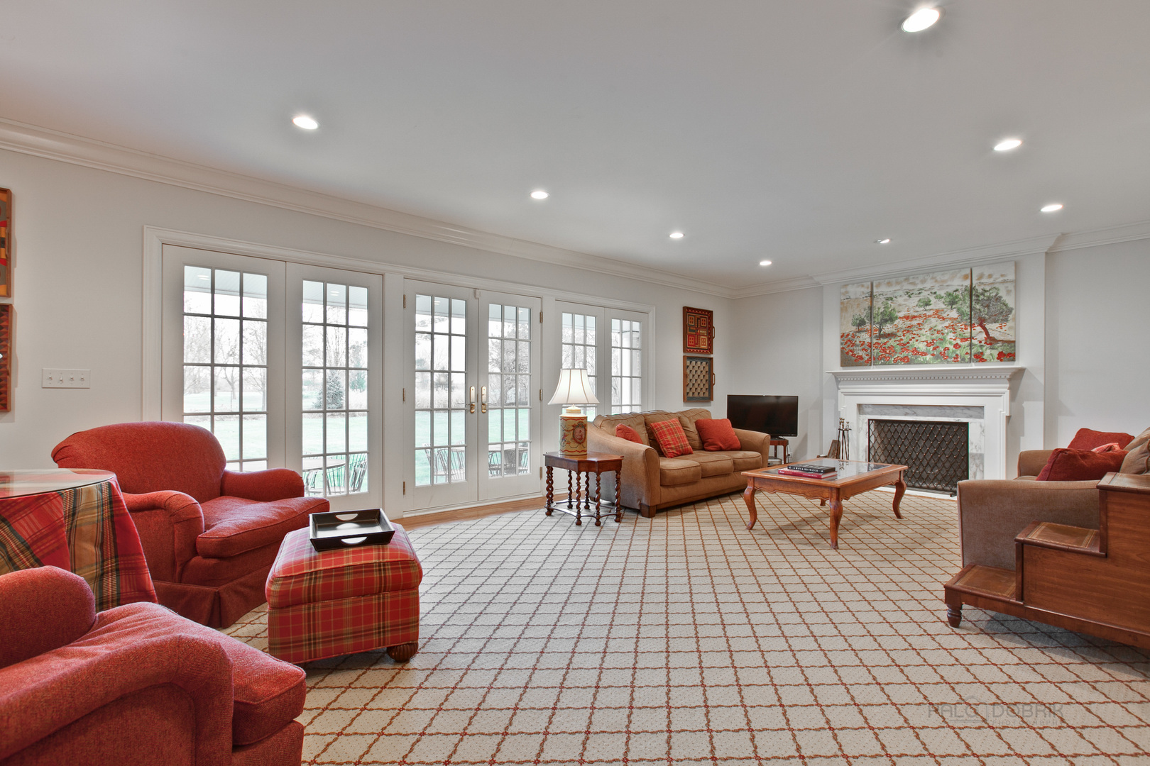 455 Landreth Lane Northfield, IL 60093 - Photo 9 of 31 a living room with furniture a rug and a fireplace