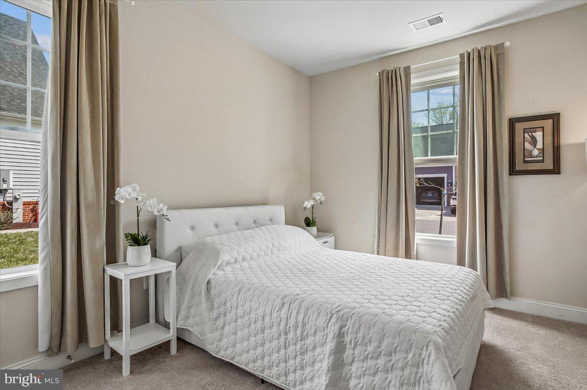 2638 Dragon Fly Way Odenton, MD 21113 - Photo 17 of 45 a bedroom with a bed and a window