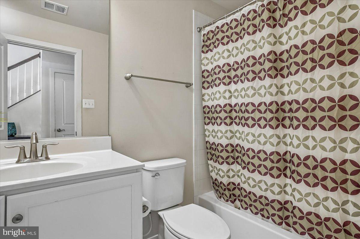 2638 Dragon Fly Way Odenton, MD 21113 - Photo 18 of 45 a bathroom with a sink toilet and shower