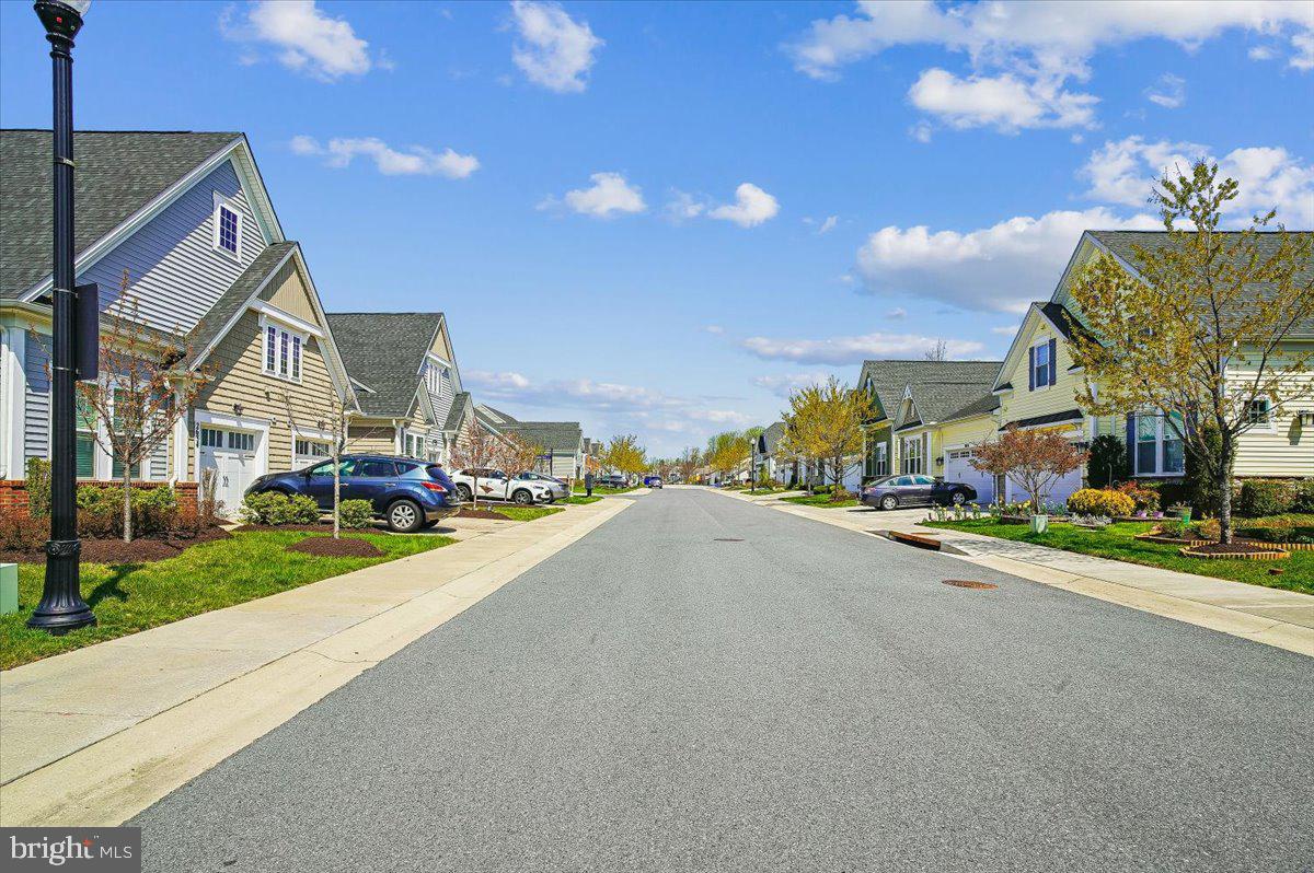 2638 Dragon Fly Way Odenton, MD 21113 - Photo 25 of 45 a view of a street with a building in the background