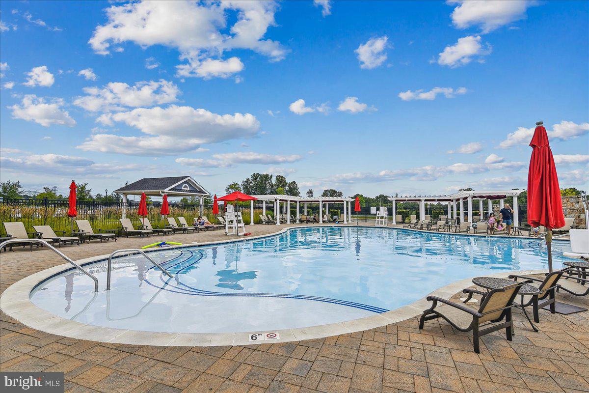 2638 Dragon Fly Way Odenton, MD 21113 - Photo 32 of 45 a swimming pool view with a outdoor seating