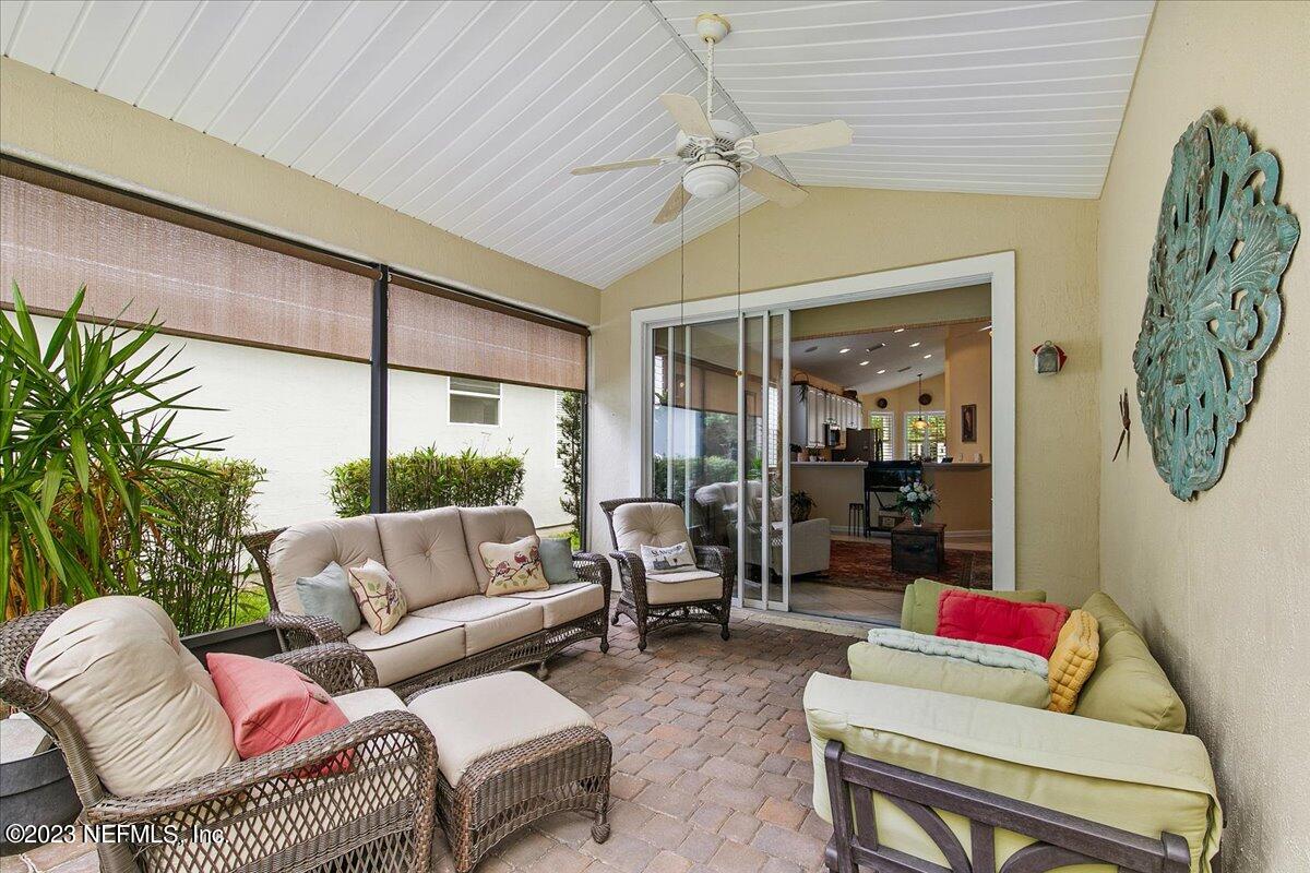 694 Copperhead Circle St. Augustine, FL 32092 - Photo 22 of 27 a living room with furniture and a large window
