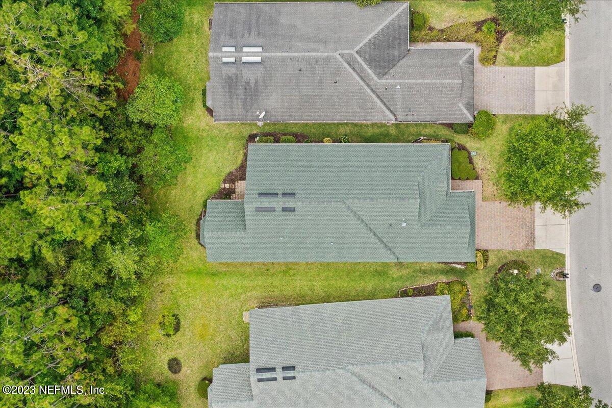 694 Copperhead Circle St. Augustine, FL 32092 - Photo 23 of 27 an aerial view of a house with a yard