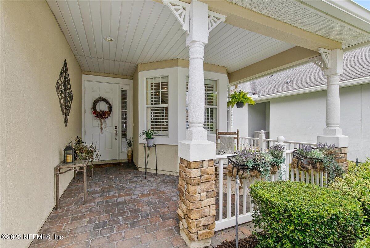 694 Copperhead Circle St. Augustine, FL 32092 - Photo 4 of 27 a view of an outdoor space with porch and patio