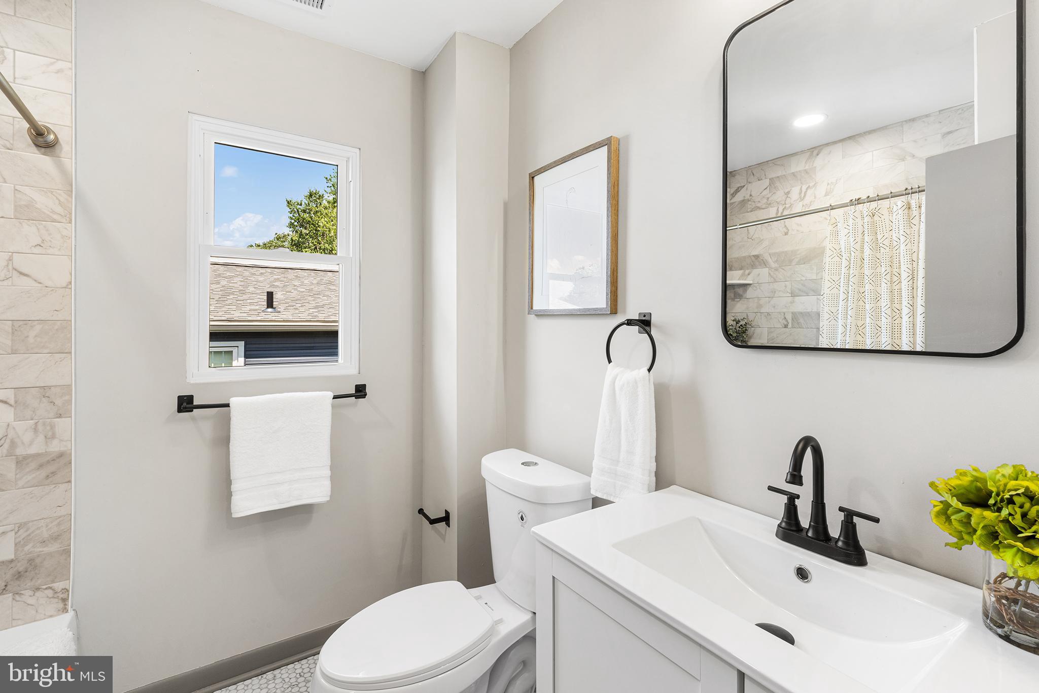 26 Virginia Circle Ridley Park, PA 19078 - Photo 20 of 49 a bathroom with a sink vanity and toilet