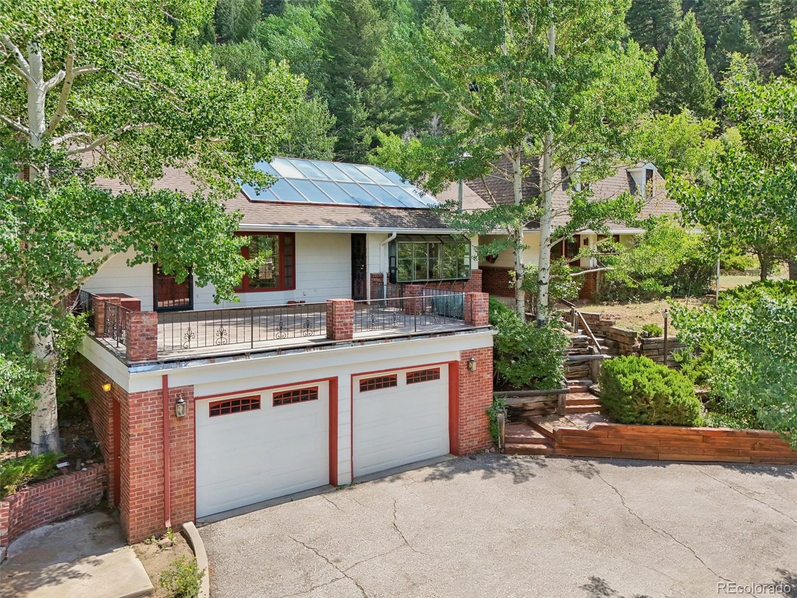 203 Ninth Street Georgetown, CO 80444 - Photo 12 of 44 a outdoor view of a house with a yard