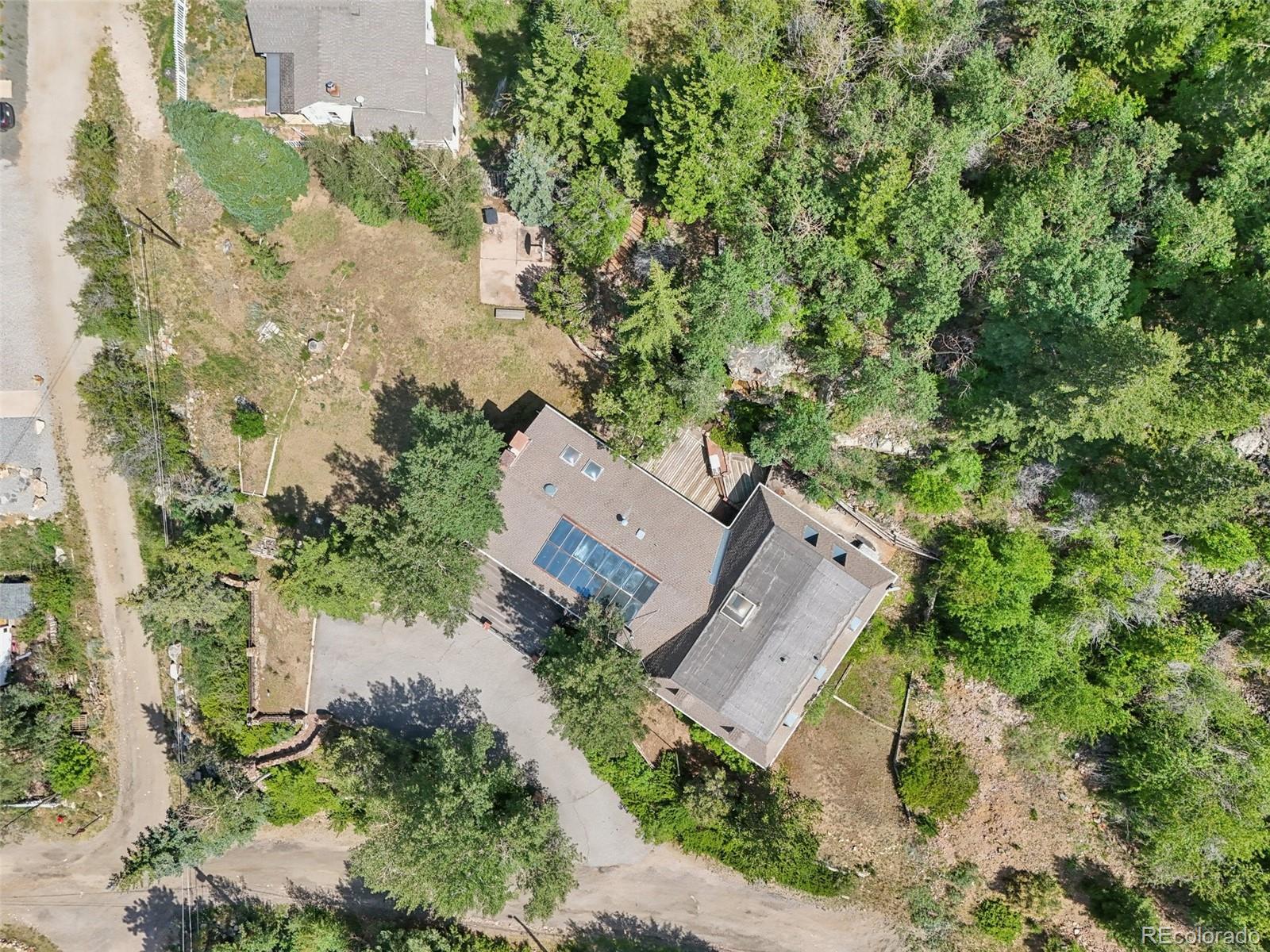 203 Ninth Street Georgetown, CO 80444 - Photo 16 of 44 an aerial view of a house with outdoor space