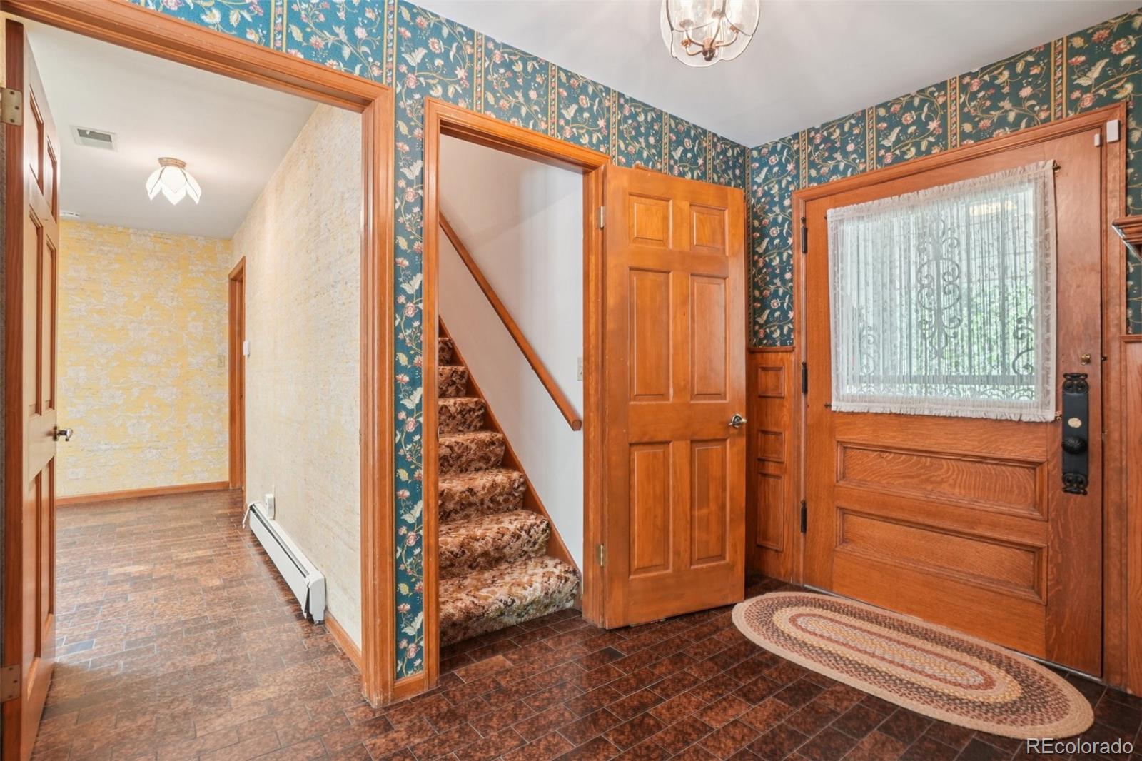 203 Ninth Street Georgetown, CO 80444 - Photo 20 of 44 a view of a room with wooden floor and windows