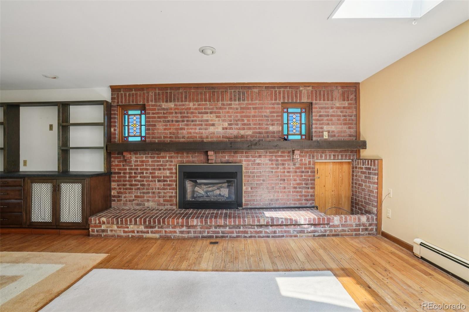 203 Ninth Street Georgetown, CO 80444 - Photo 26 of 44 a view of a fireplace in a room