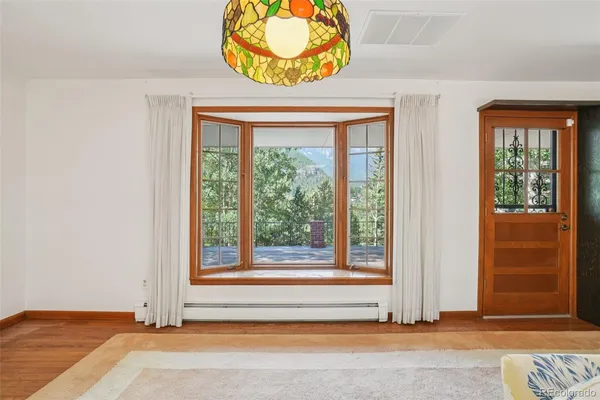 an empty room with window