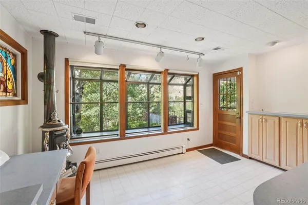 a view of an empty room with a window