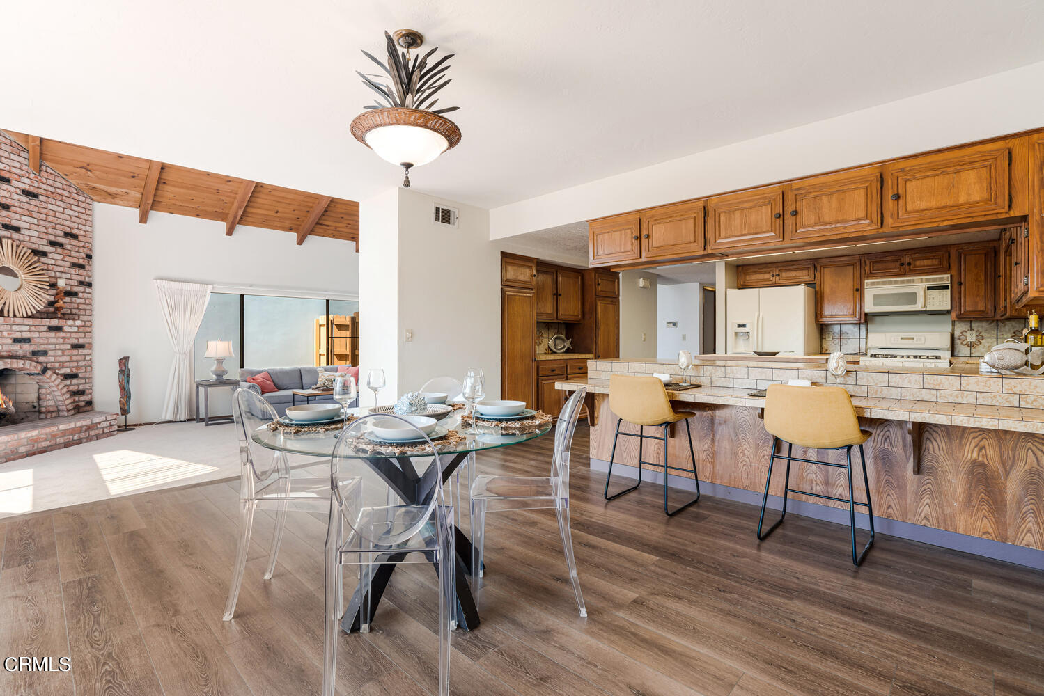 2101 Napoli Drive Oxnard, CA 93035 - Photo 14 of 50 a view of a dining room with furniture and wooden floor
