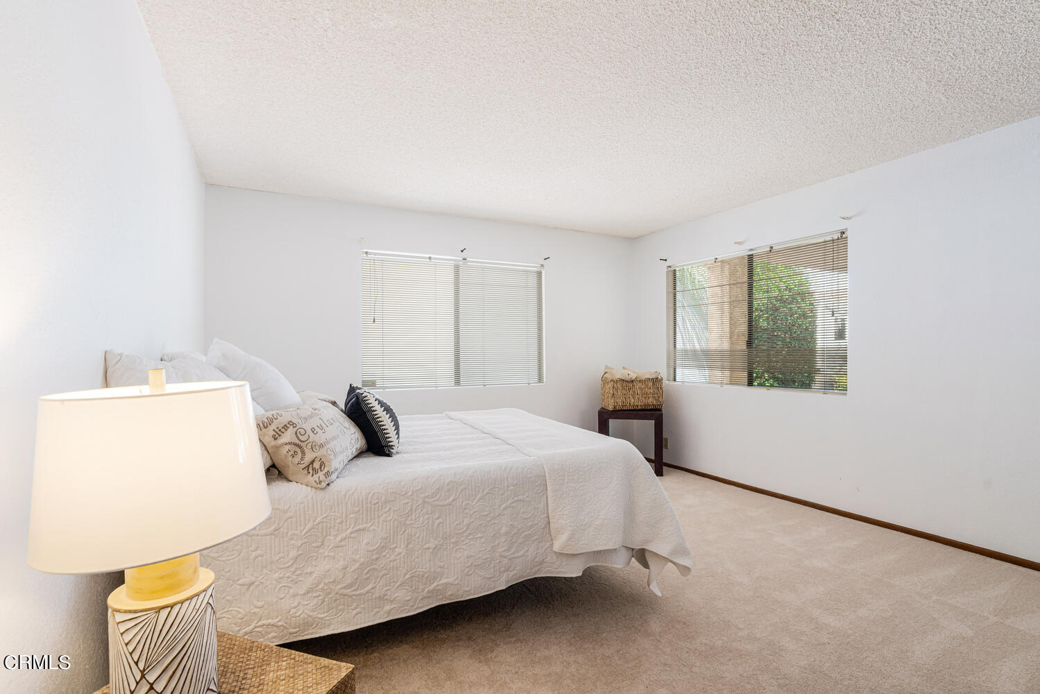 2101 Napoli Drive Oxnard, CA 93035 - Photo 22 of 50 a bedroom with a bed and a window