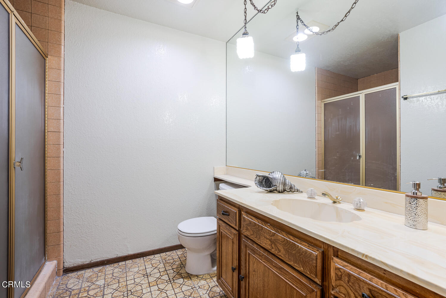 2101 Napoli Drive Oxnard, CA 93035 - Photo 23 of 50 a bathroom with a sink vanity granite and toilet