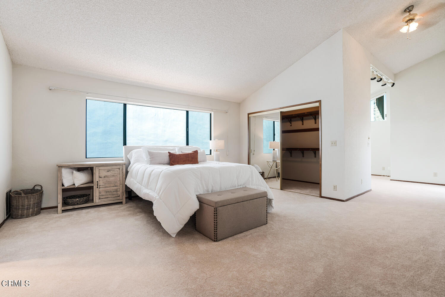 2101 Napoli Drive Oxnard, CA 93035 - Photo 29 of 50 a spacious bedroom with a bed and a window