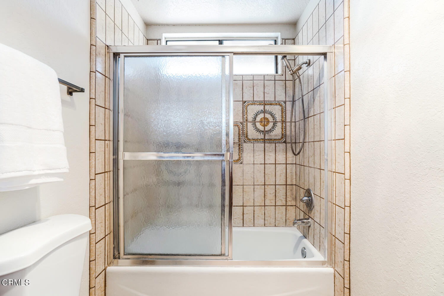 2101 Napoli Drive Oxnard, CA 93035 - Photo 32 of 50 a bathroom with a bathtub and a shower
