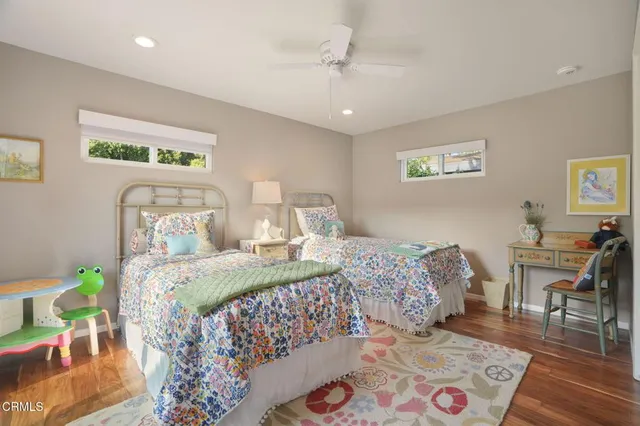 a bedroom with bed and a table