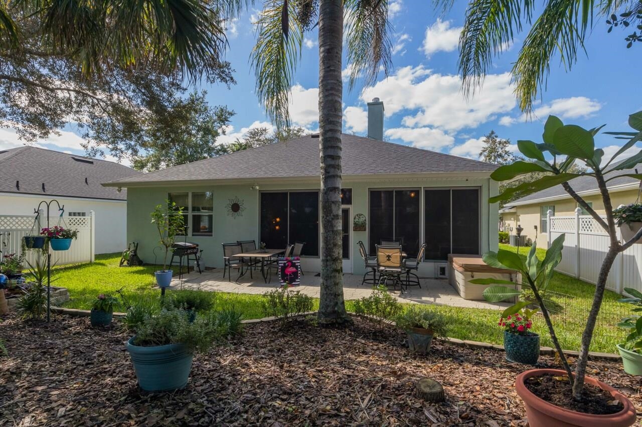 1041 Ridgewood Lane St. Augustine, FL 32086 - Photo 18 of 40 a front view of a house with garden