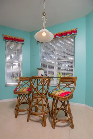 a refrigerator freezer sitting inside of a kitchen