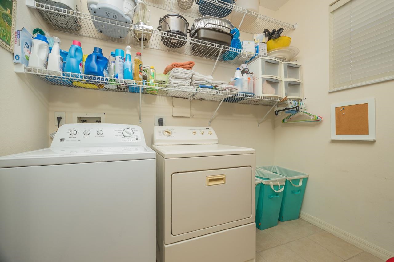 1041 Ridgewood Lane St. Augustine, FL 32086 - Photo 40 of 40 a utility room with dryer and washer