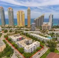 a view of a city with tall buildings