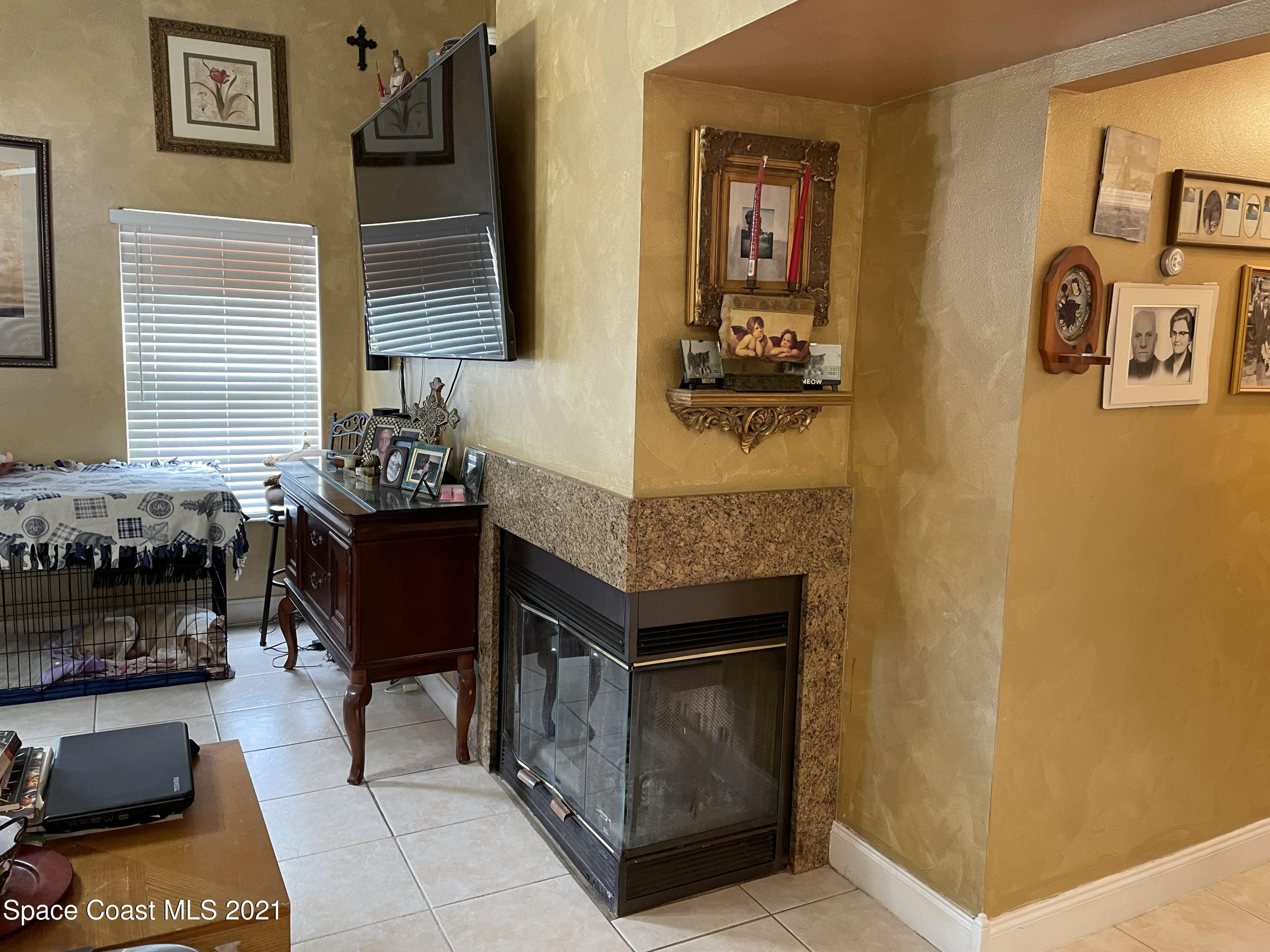 751 Becker Avenue Northeast Palm Bay, FL 32905 - Photo 8 of 20 Family Room w Corner Fireplace