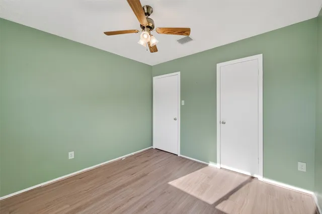 a backyard of a house with outdoor seating