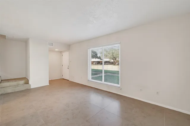 an empty room with a window