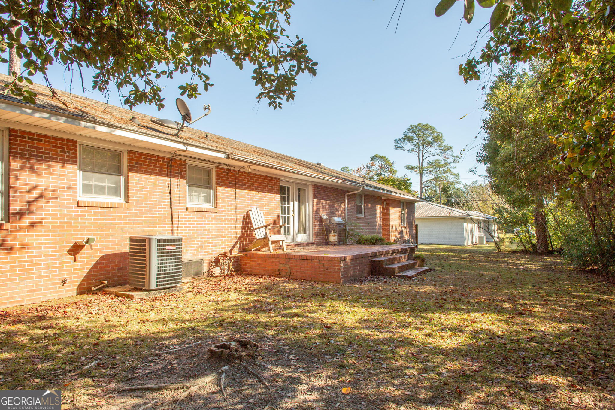 403 Preston Street Waycross, GA 31501 - Photo 11 of 36 a front view of a house with a yard