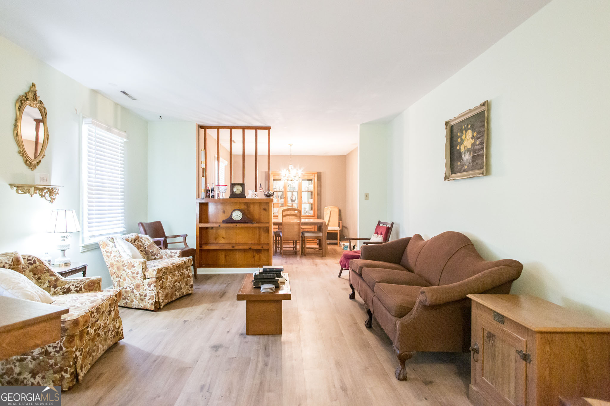 403 Preston Street Waycross, GA 31501 - Photo 16 of 36 a living room with furniture and a window
