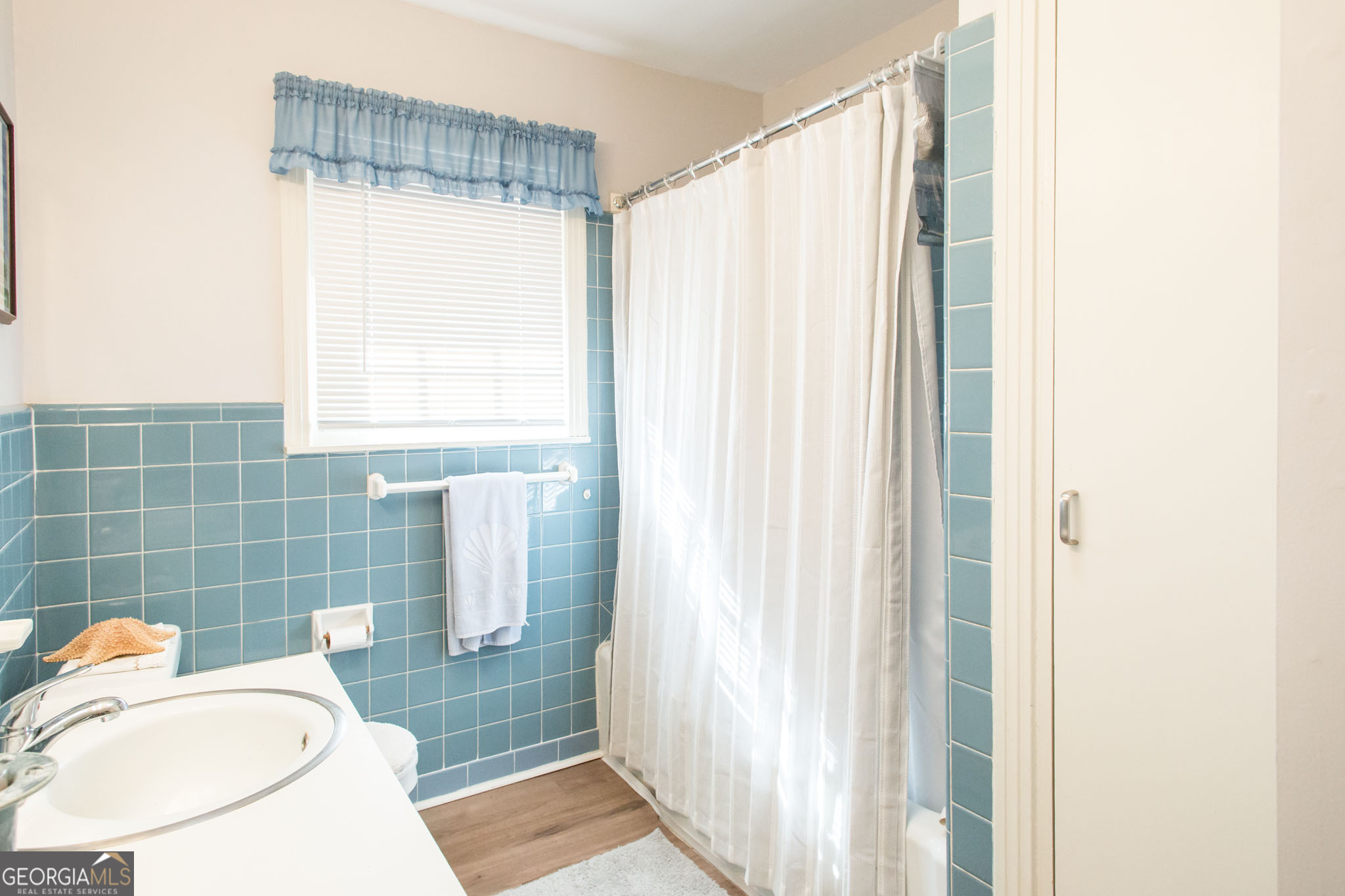 403 Preston Street Waycross, GA 31501 - Photo 26 of 36 a bathroom with a sink toilet and shower