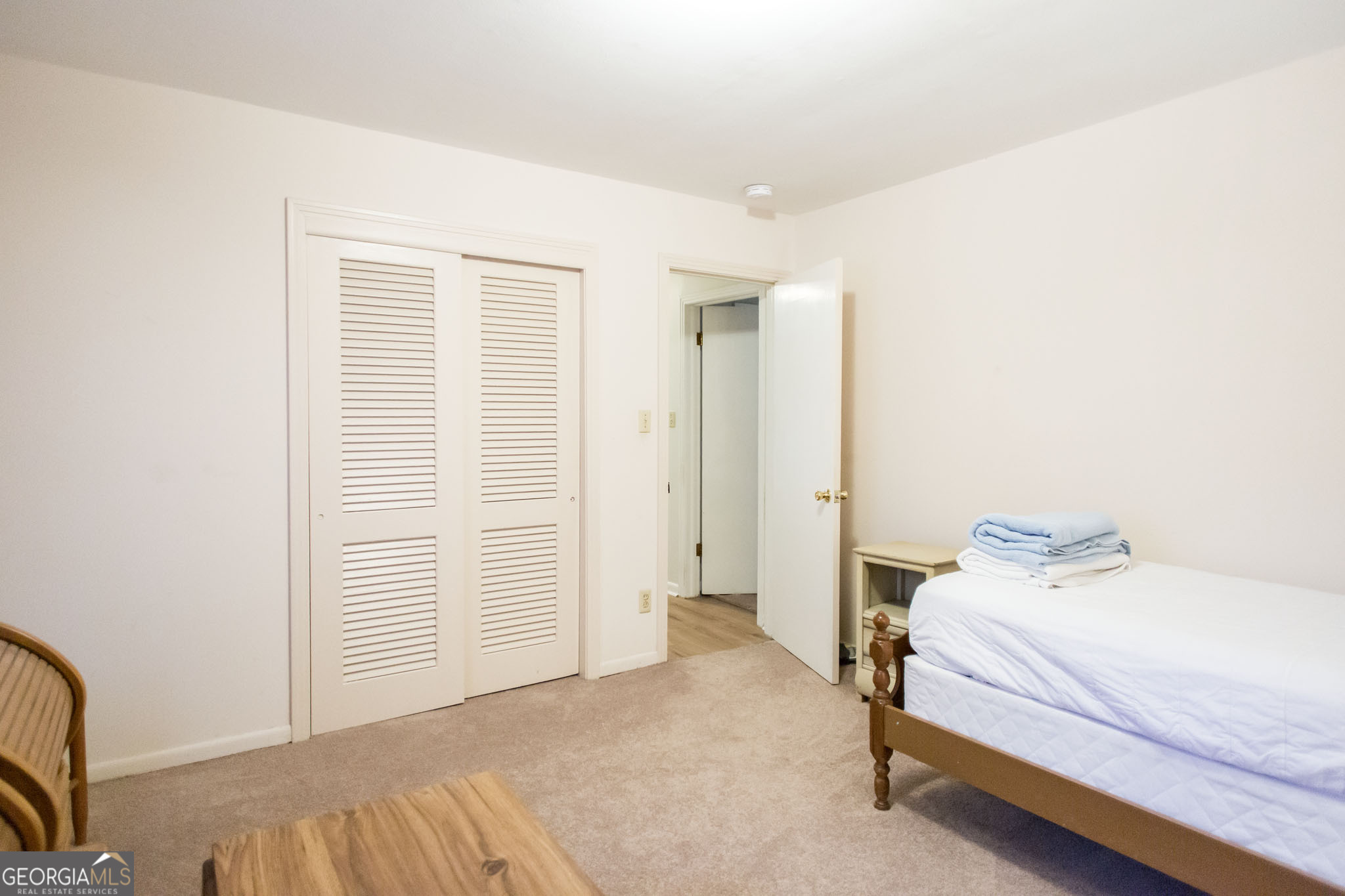 403 Preston Street Waycross, GA 31501 - Photo 30 of 36 a bedroom with a bed and a window