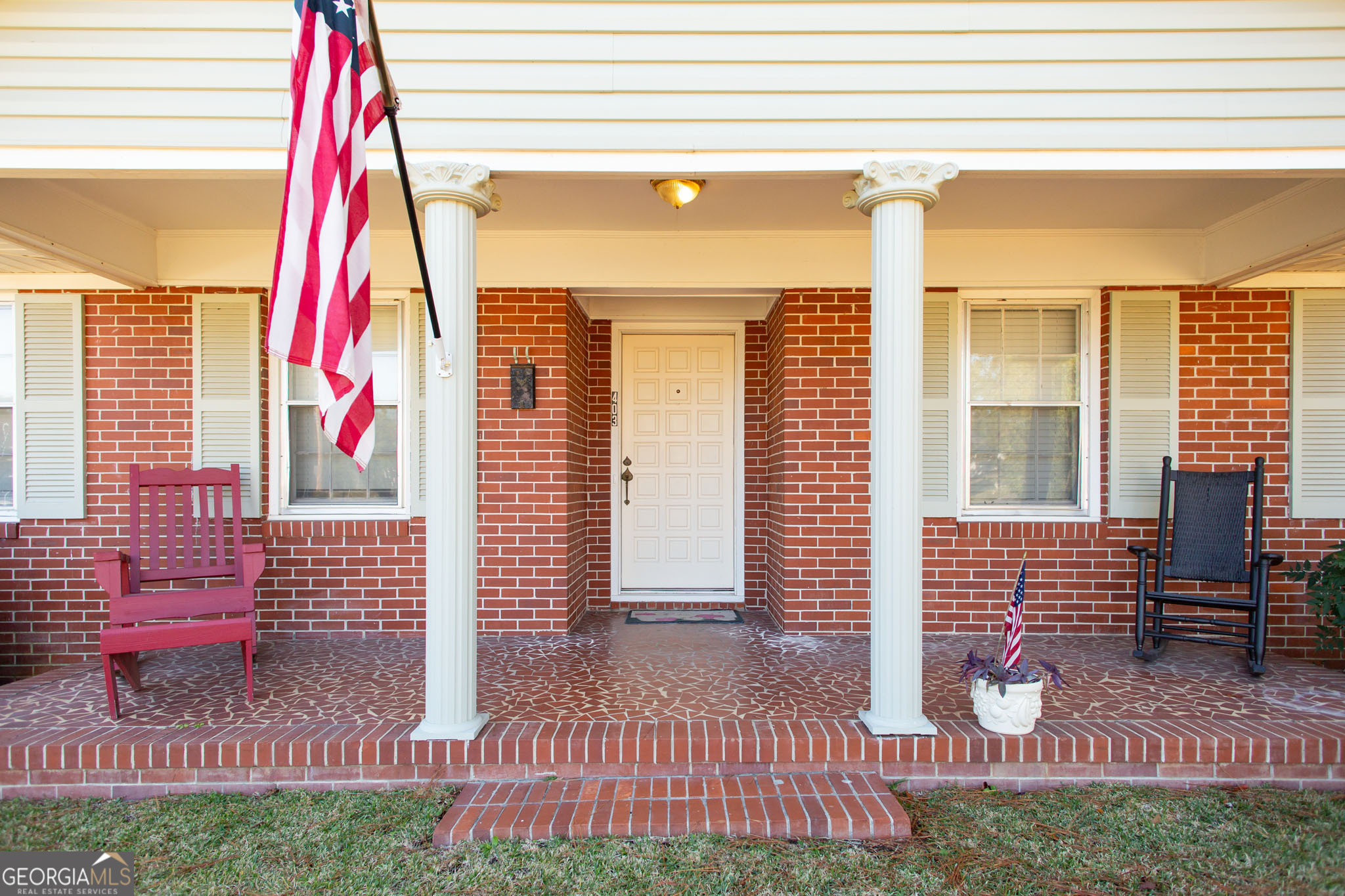403 Preston Street Waycross, GA 31501 - Photo 4 of 36 a front view of a house with a yard