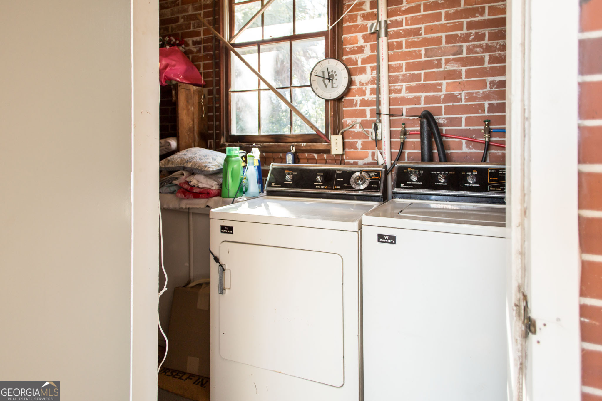 403 Preston Street Waycross, GA 31501 - Photo 7 of 36 a utility room with dryer and washer
