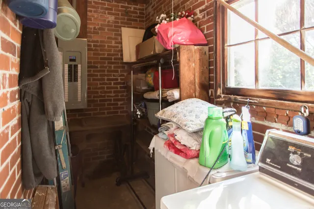 a backyard of a house with yard and outdoor seating